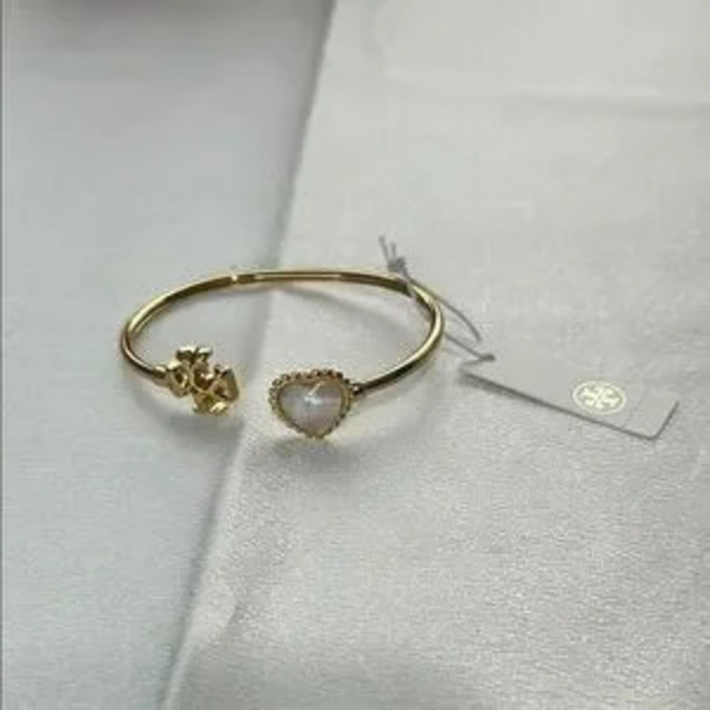 Brand new Tory Burch gold bracelet